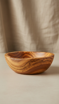 Olive wood serving bowl with organic grain