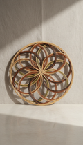 Handcrafted rattan wall art in geometric weave